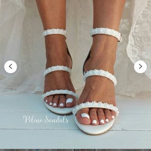 I ordered these off of Etsy from Pelino Sandals. 
Size 7
Brand new
Ivory